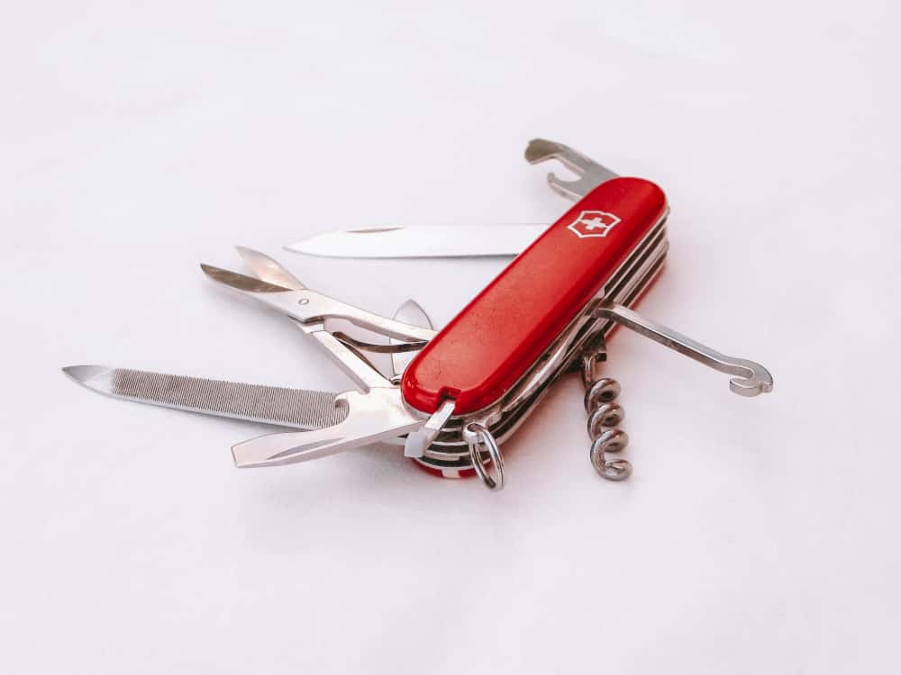 A Swiss army knife with scissors, corkscrew and file