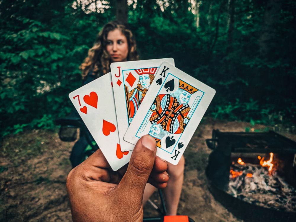 Two people playing a card game