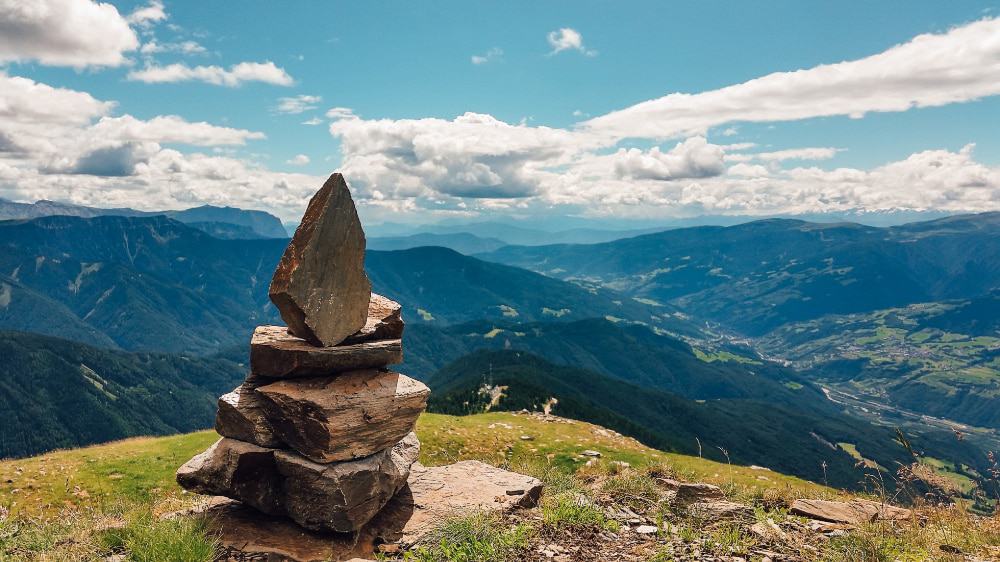 A stack of stones, known as a cairn, marking the summit. 