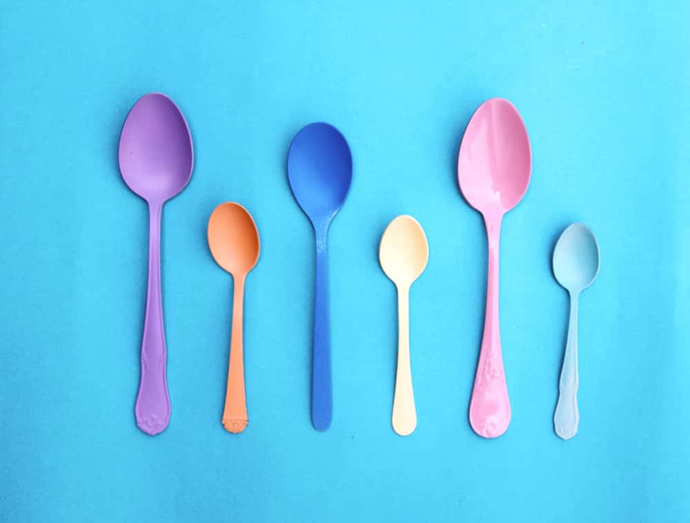 A collection of plastic spoons