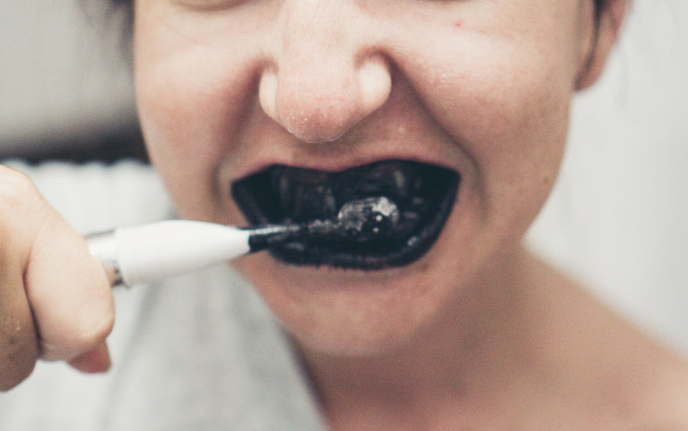 Try wood ash from a fire to remove stains from your teeth with. 